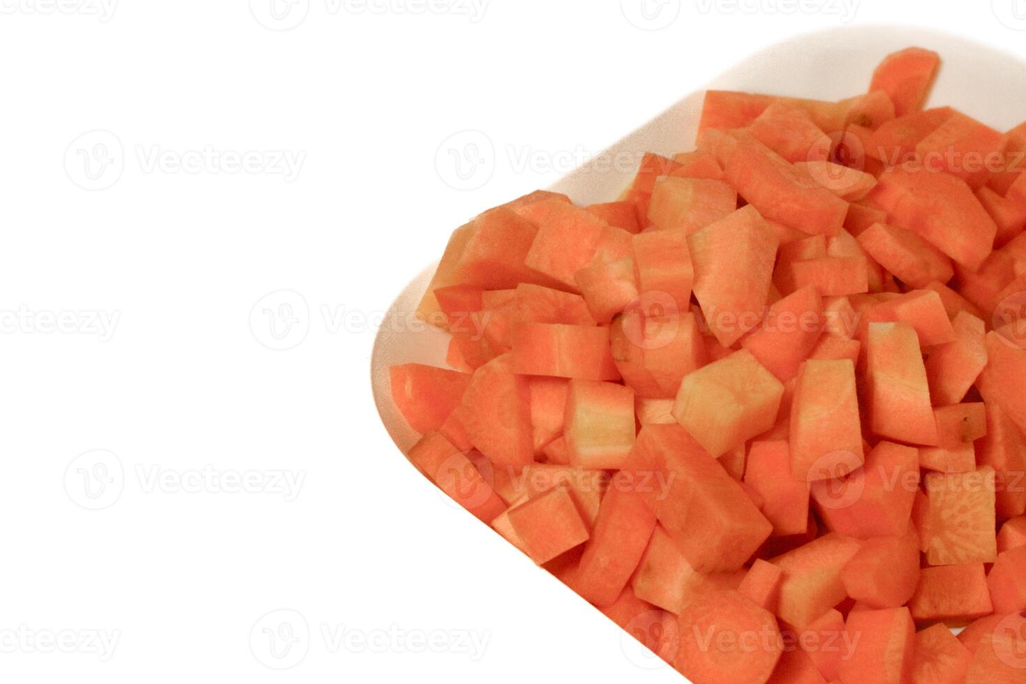 tritato carota cubi, verdura modello sfondo foto