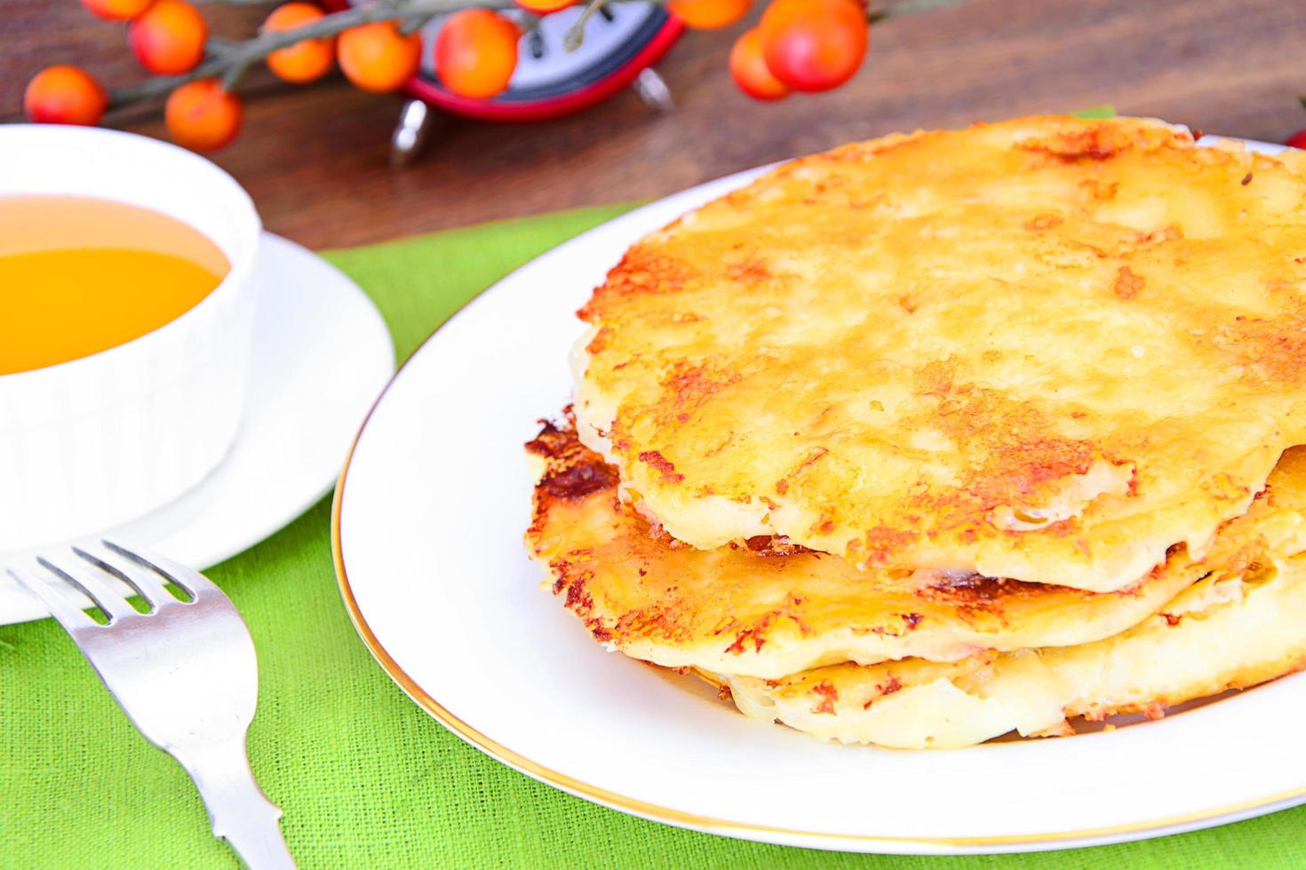 frittelle di formaggio con miele foto