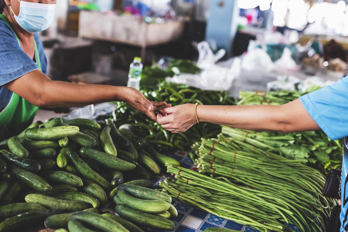 moneta pagamento per mercato venditori . scambio concetto foto