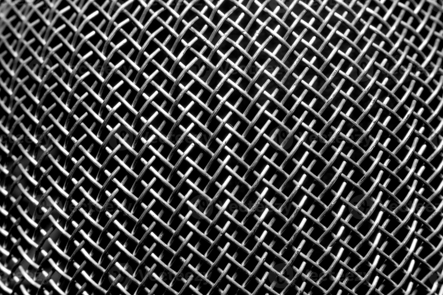 monocromatico struttura di un' brillante metallo colino o grattugiare. astratto sfondo. foto