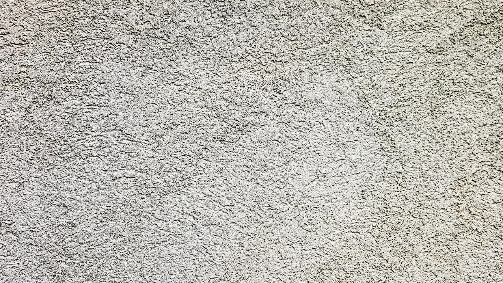 struttura del muro di cemento. sfondo muro stucco bianco. muro di cemento verniciato bianco. muro di cemento bianco e pavimento come trama di sfondo. loft nello stile delle idee di design di un edificio residenziale. foto