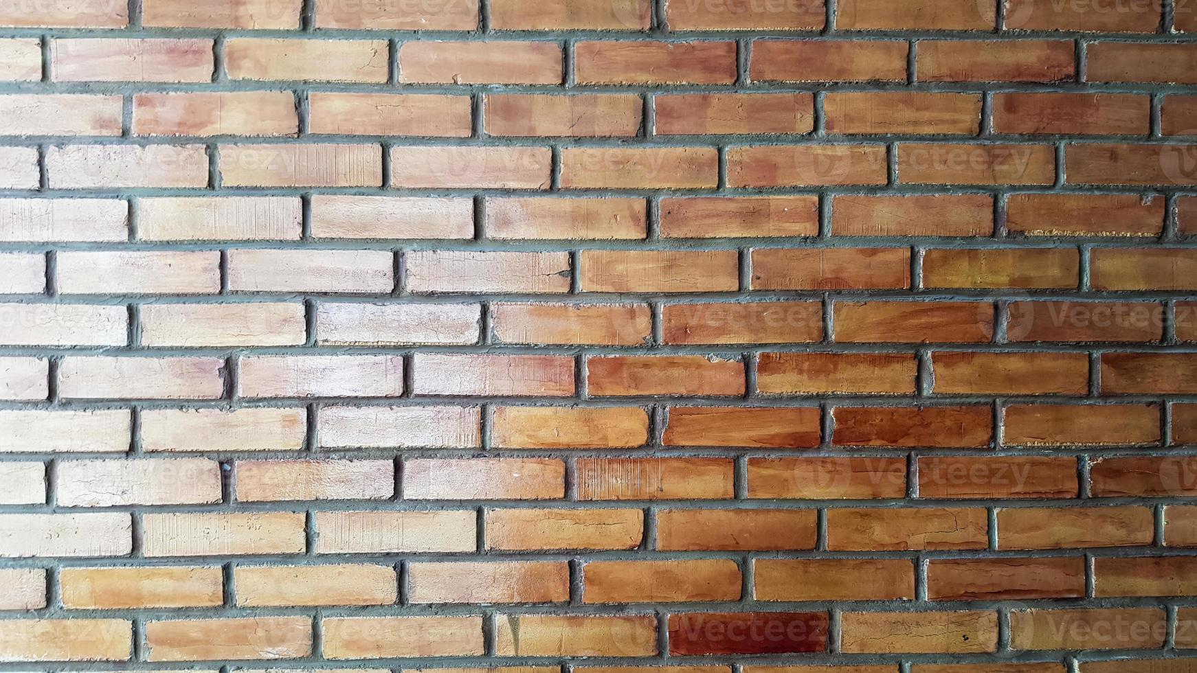 vecchio muro di mattoni rossi strutturato. una foto di mattoni dall'aspetto gradevole.