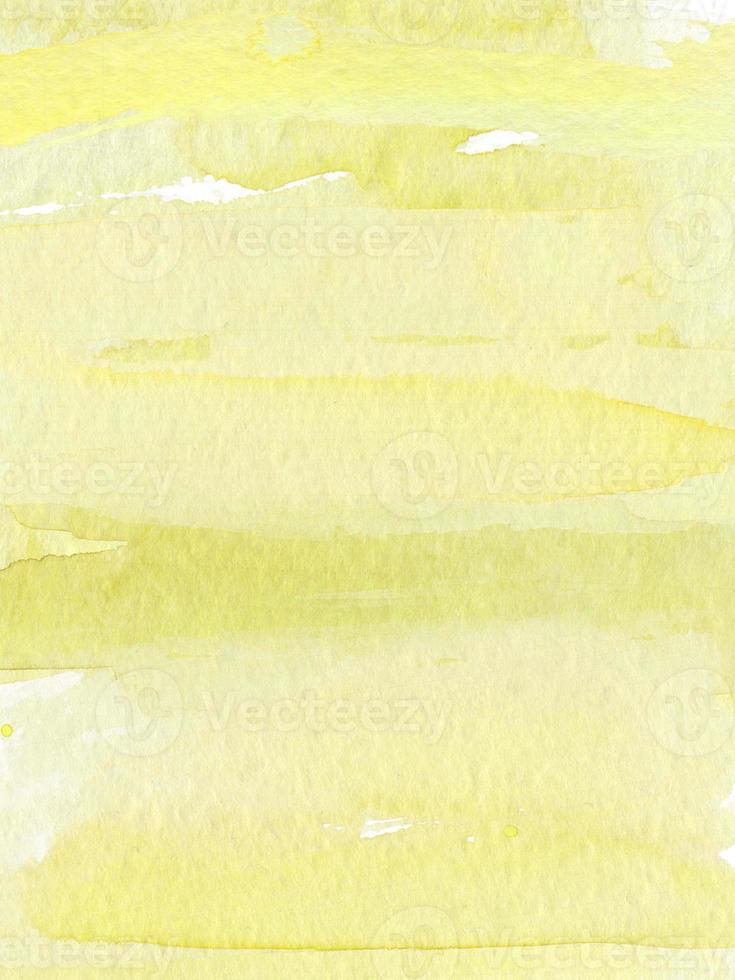 Abstract giallo acquerello dipinto gradiente grunge texture con macchie e schizzi di vernice a mano su bianco. foto