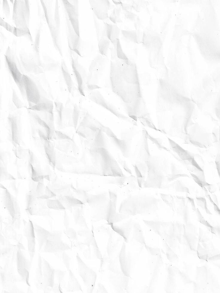 carta stropicciata di colore bianco. pagina di carta stropicciata realistica. trama danneggiata in astratto. materiale di fondo rugoso. foto