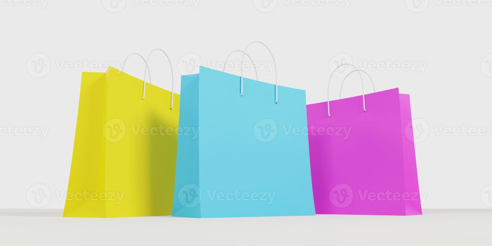 rendering 3D. sacchetti della spesa di carta gialla, blu e rosa su sfondo bianco. vista dal basso, primo piano. foto