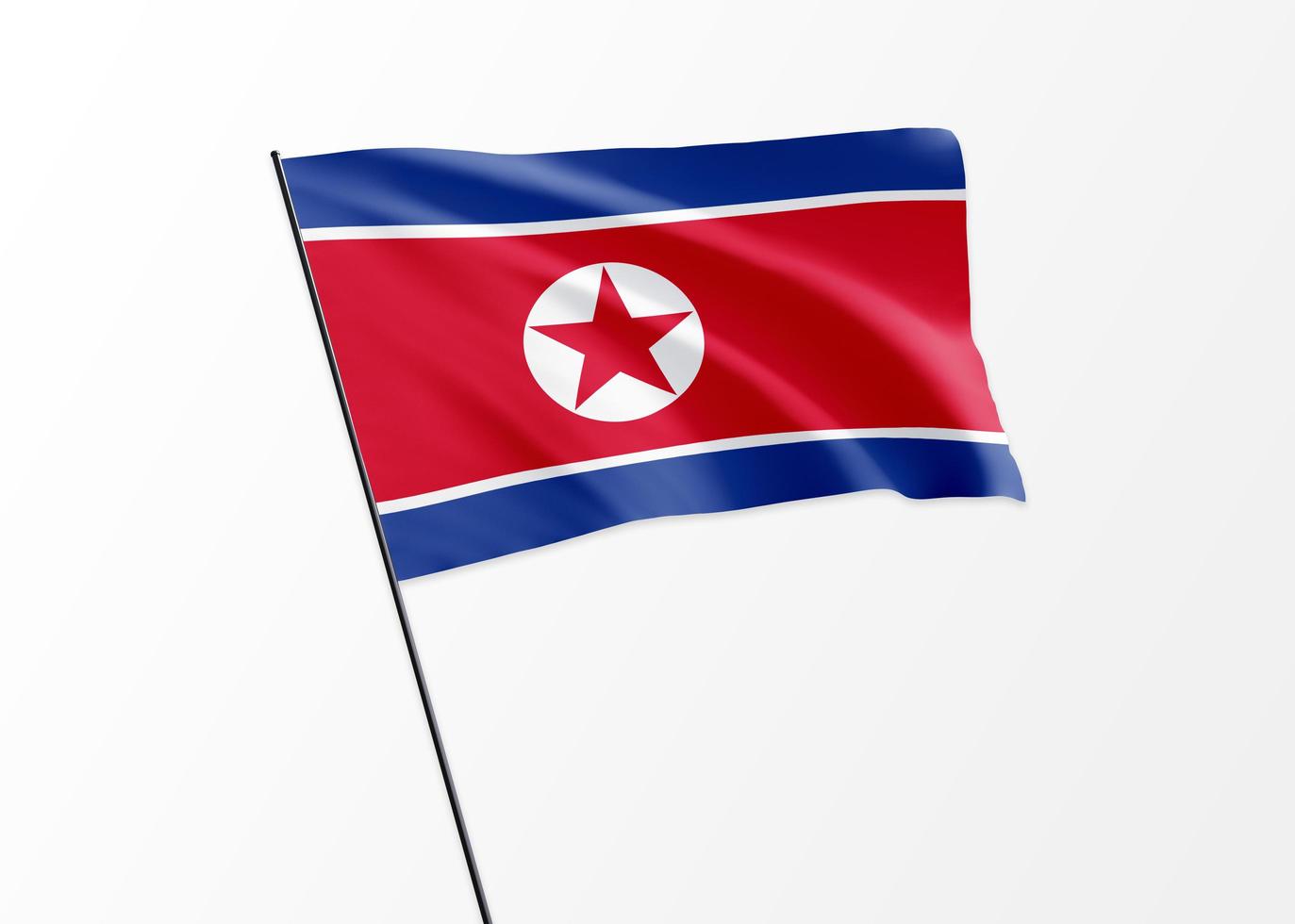 bandiera della corea del nord che sventola in alto sullo sfondo isolato festa dell'indipendenza della corea del nord. Collezione di bandiere nazionali del mondo con illustrazione 3D foto