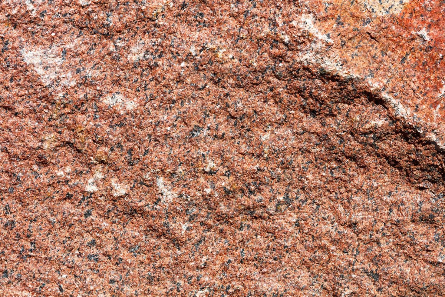 struttura di pietra di granito rosso. alta risoluzione, primo piano. foto