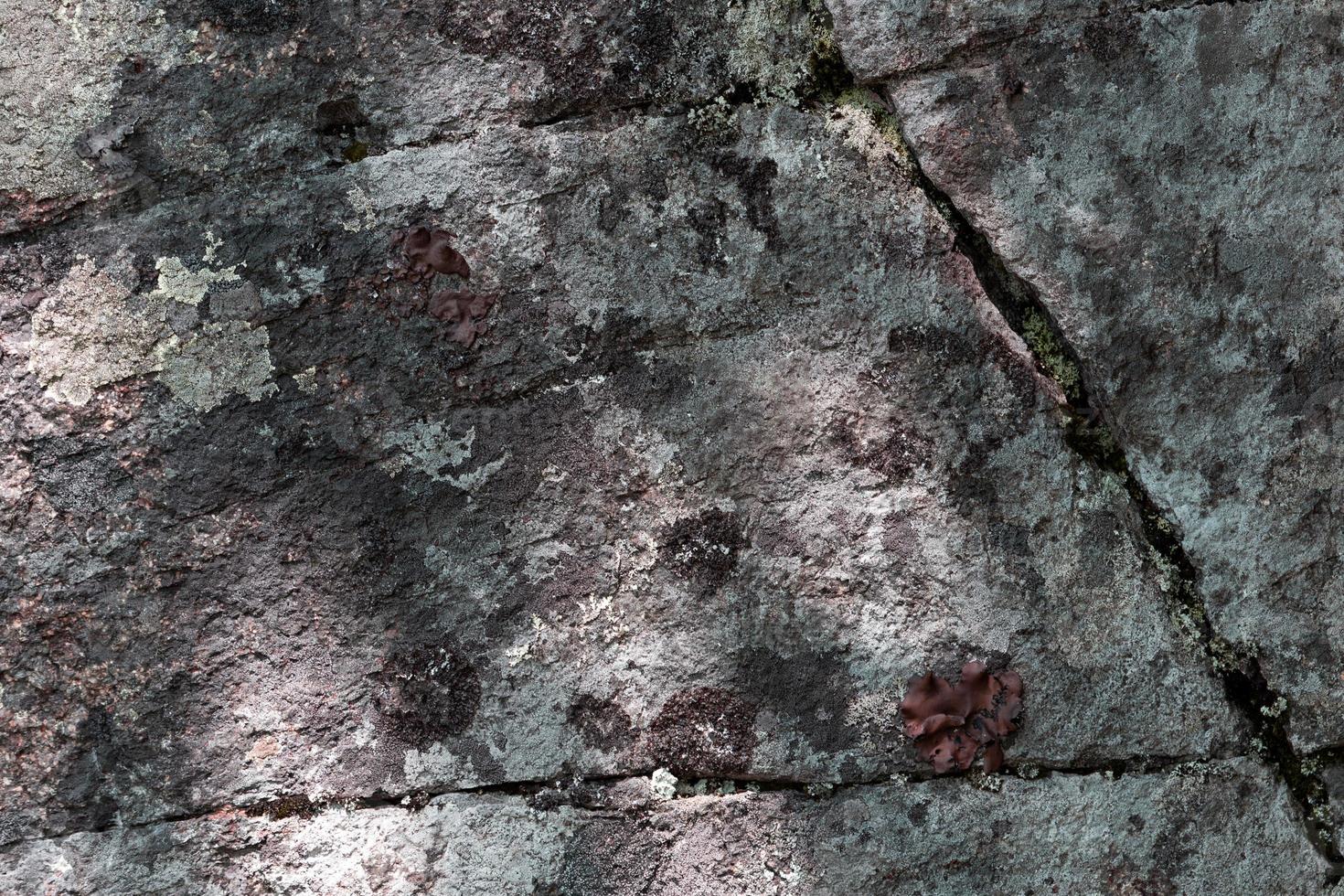 texture roccia grigia e nera le pietre nere grigio scuro sono tutte marmo e texture per la produzione di piastrelle foto