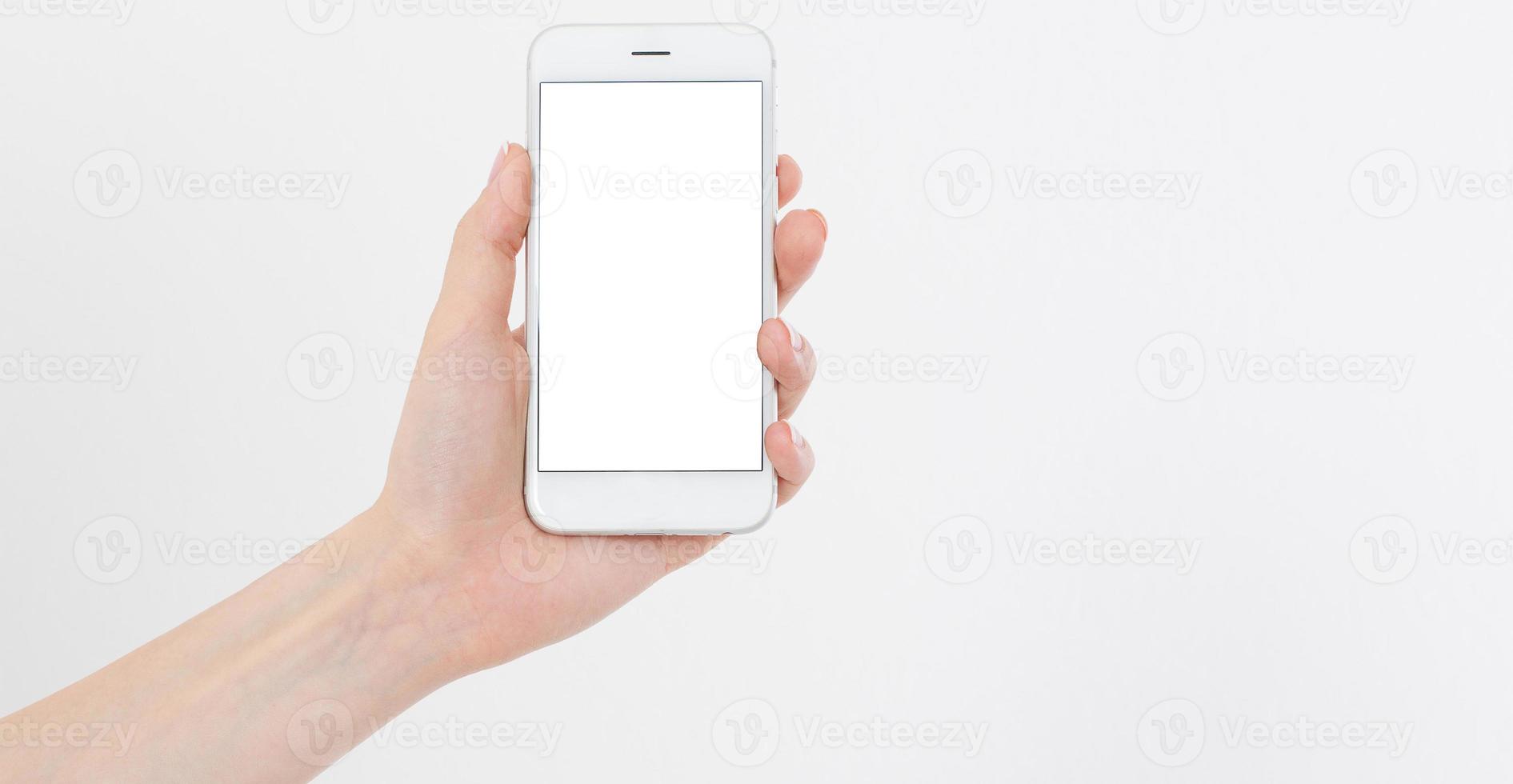smartphone in una mano, display vuoto, spazio di copia foto