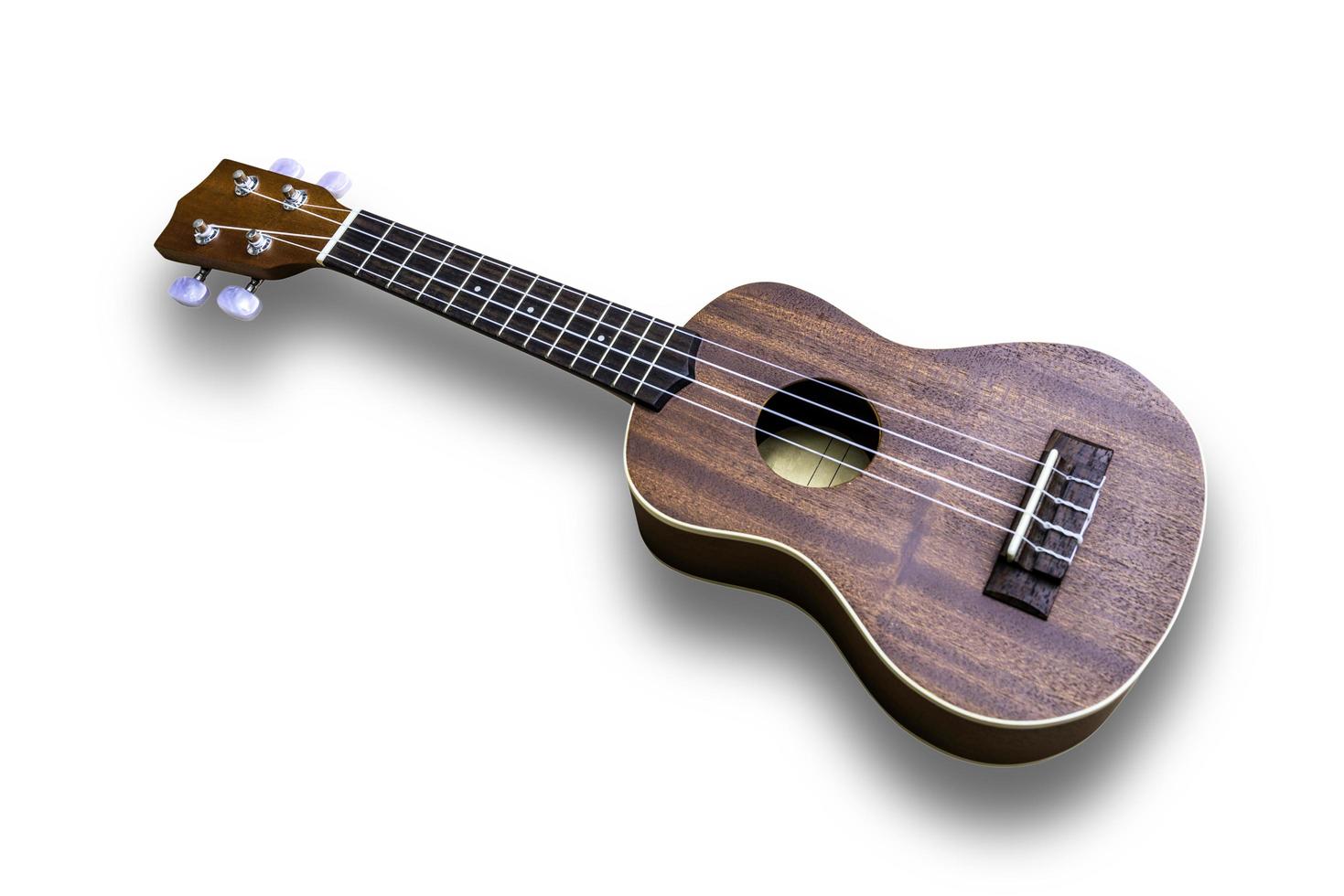 ukulele chitarra hawaiana isolata su sfondo bianco foto
