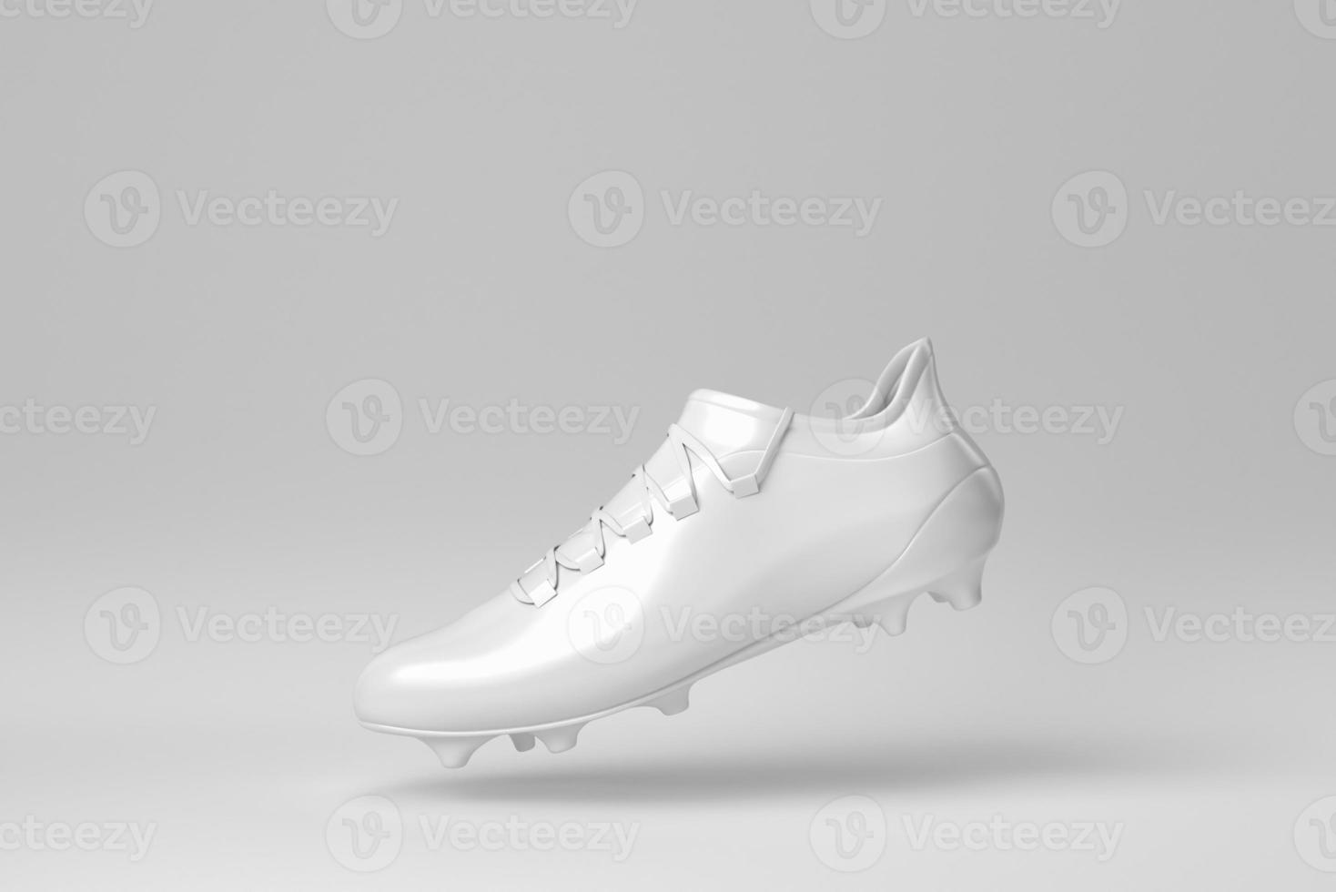 stivali da calcio. scarpe da calcio su sfondo bianco. concetto minimo. rendering 3d. foto