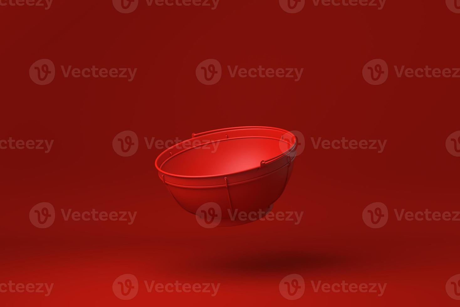ciotola rossa in acciaio inossidabile galleggiante su sfondo rosso. idea di concetto minimale creativa. monocromo. rendering 3d. foto