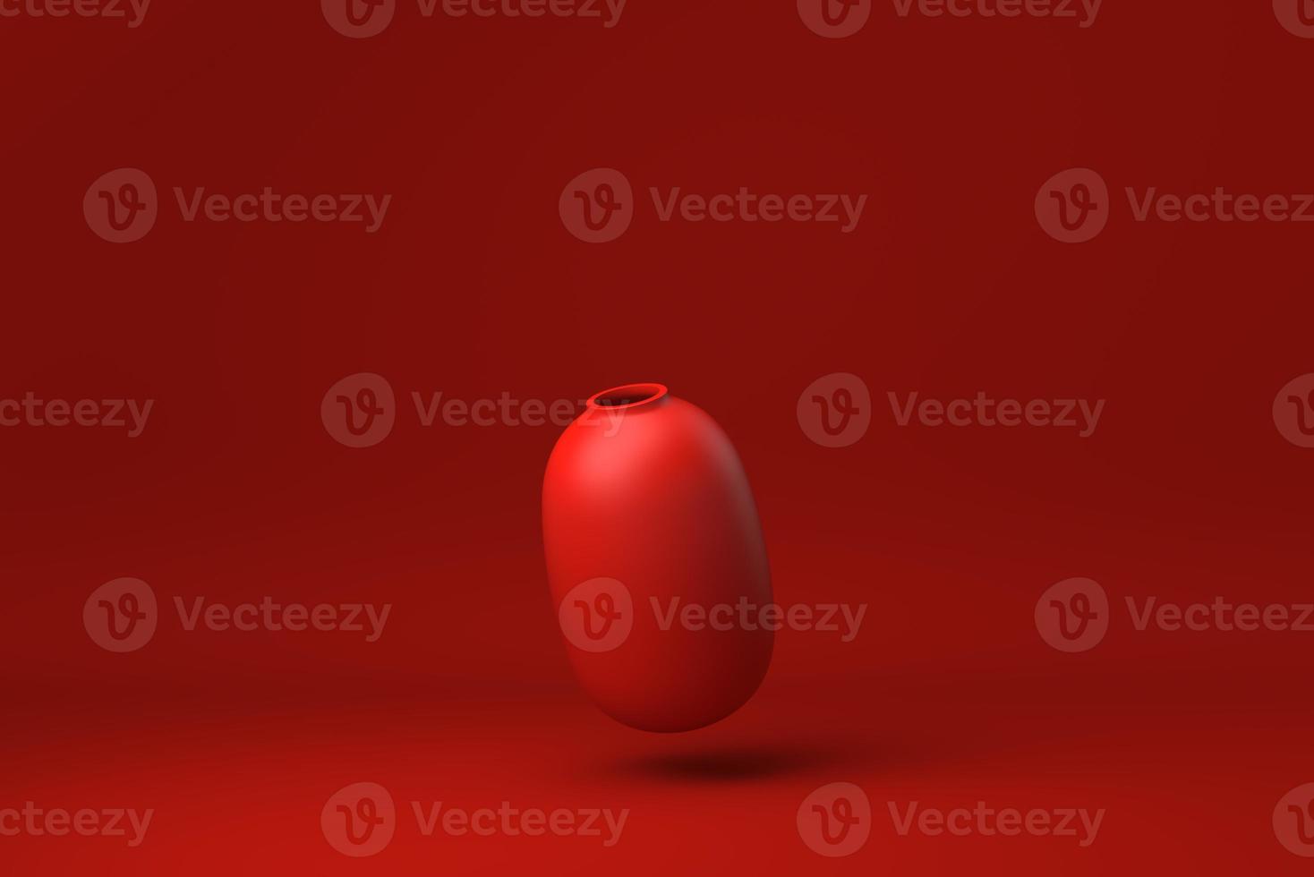 ceramica rossa che galleggia su sfondo rosso. idea di concetto minimale creativa. monocromo. rendering 3d. foto