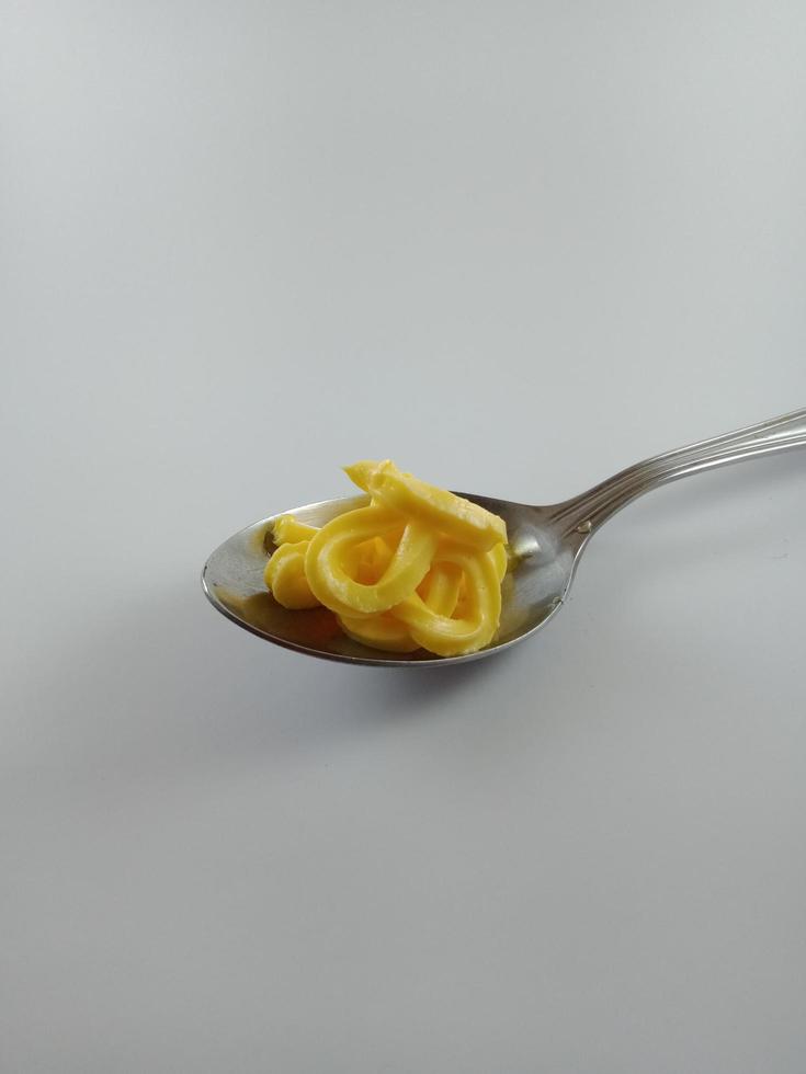 cucchiaio semplice e attraente di immagine di sfondo illustrazione margarina foto