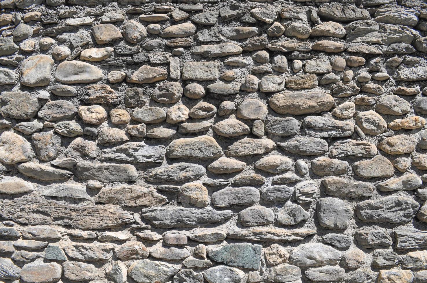 sfondo muro di pietra grigia foto