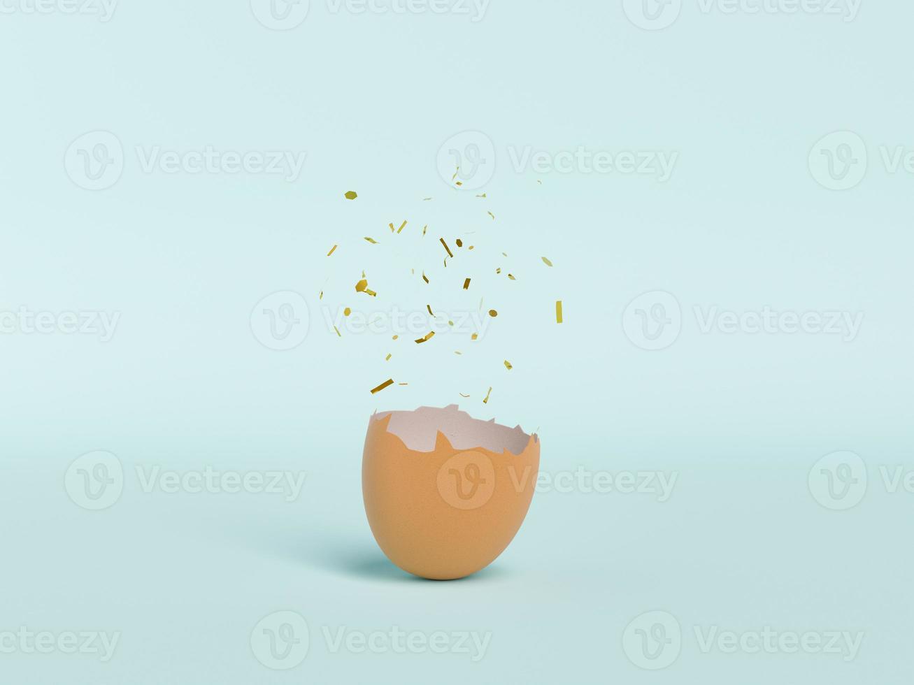 guscio d'uovo rotto con coriandoli che escono foto