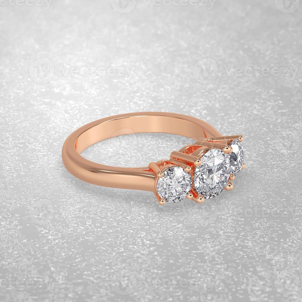 Anello di fidanzamento con 3 pietre che stabilisce la posizione in oro rosa 3d rendering foto