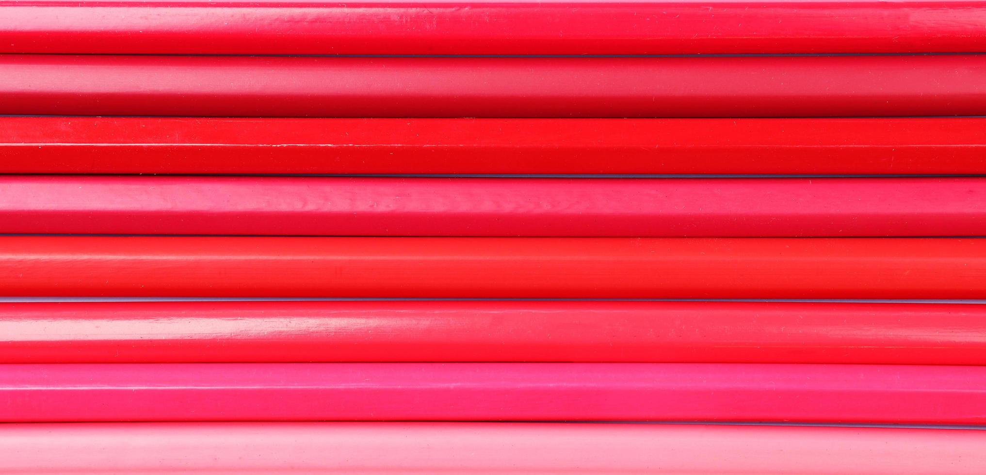 il motivo creato con matite colorate viene utilizzato come sfondo colorato. foto