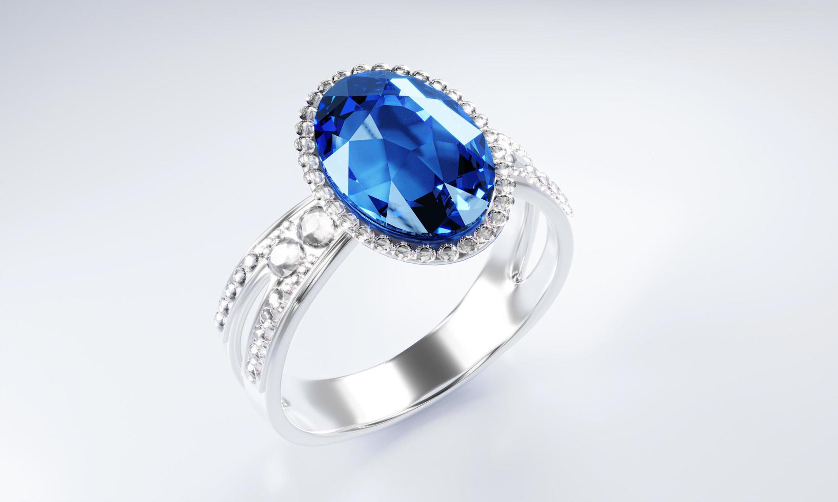 il grande diamante blu di forma ovale è contornato da tanti diamanti sull'anello in oro platino posto su fondo grigio. elegante anello di diamanti da sposa per donna. rendering 3D foto
