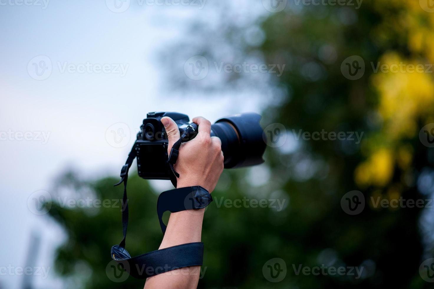 fotografia a mano e attrezzatura fotografica del fotografo concept photographer foto