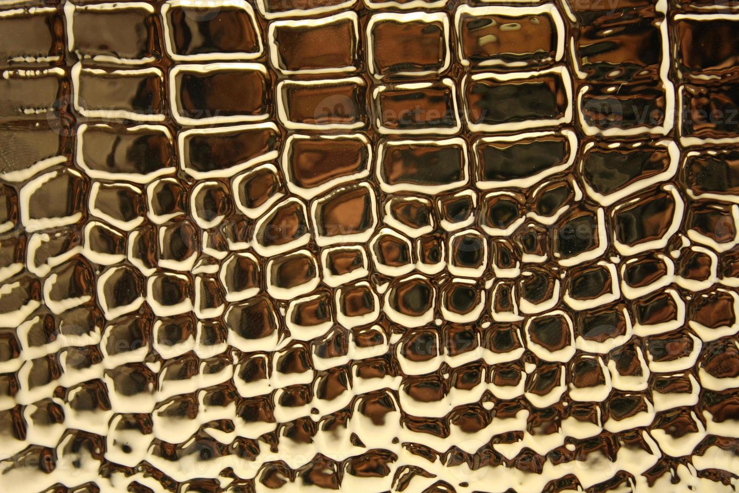 struttura in pelle di coccodrillo metallico con per lo sfondo foto