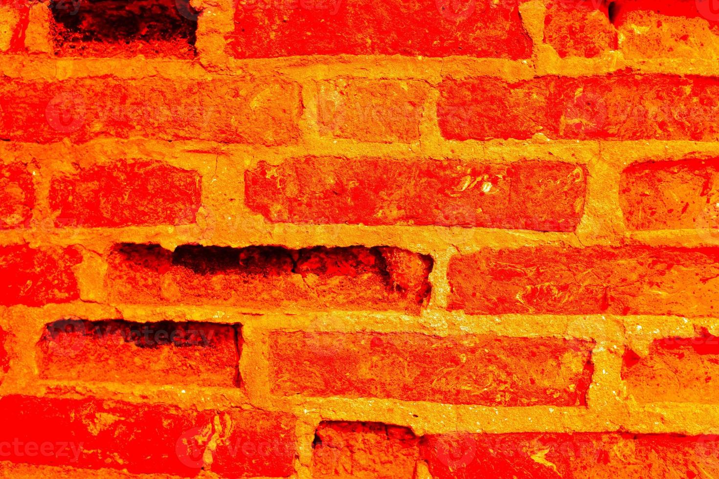 trama vecchio muro di cemento. arancione - muro di mattoni di colore tenue come sfondo. foto