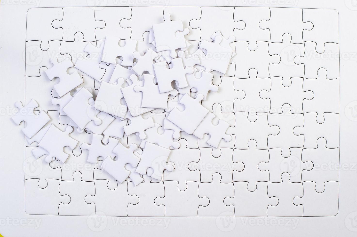 puzzle bianchi mettono insieme un'idea imprenditoriale foto