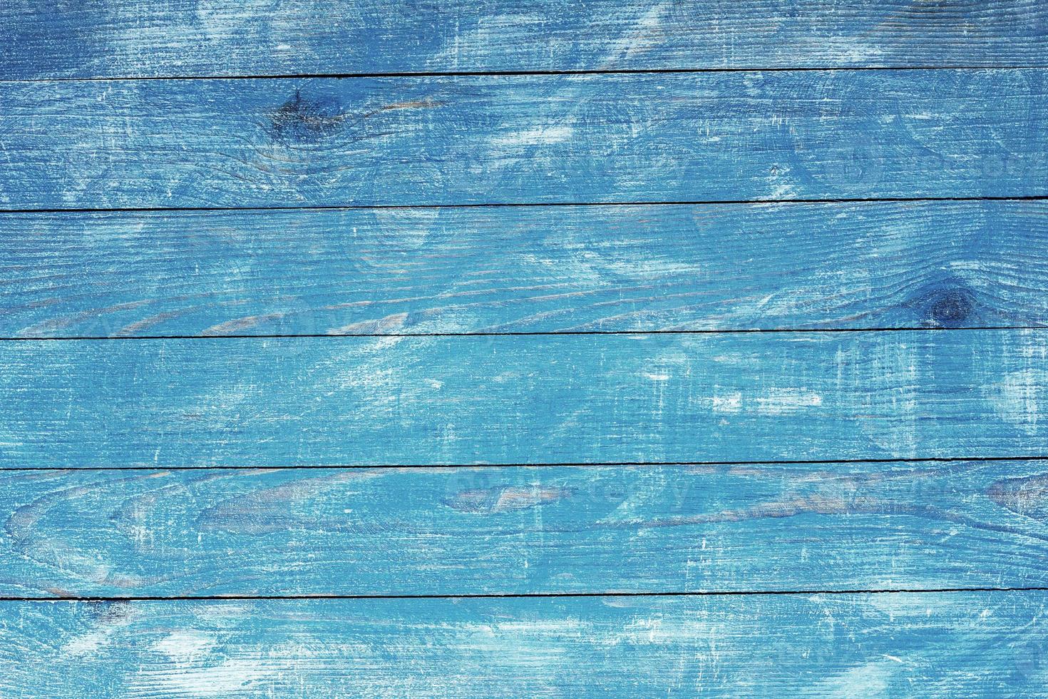 texture di sfondo in legno blu vintage con nodi e fori per unghie. vecchio muro di legno dipinto. sfondo astratto blu. tavole orizzontali blu scuro in legno vintage. foto