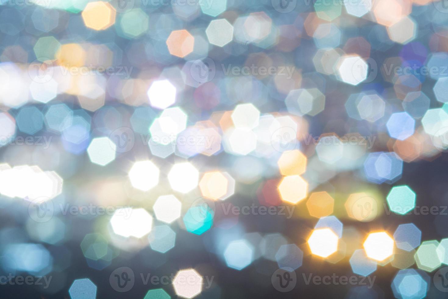 astratto, bellissimo paesaggio bokeh della città di notte, luce bokeh e tramonto della città sfocato foto