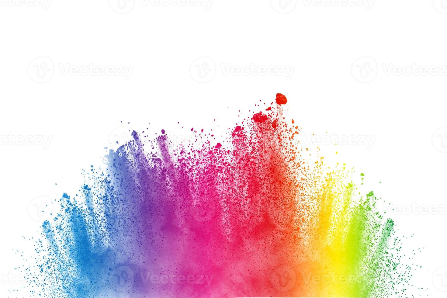 esplosione di polvere multi colore astratta su sfondo bianco. congelare il movimento degli schizzi di particelle di polvere. dipinto holi in festival. foto