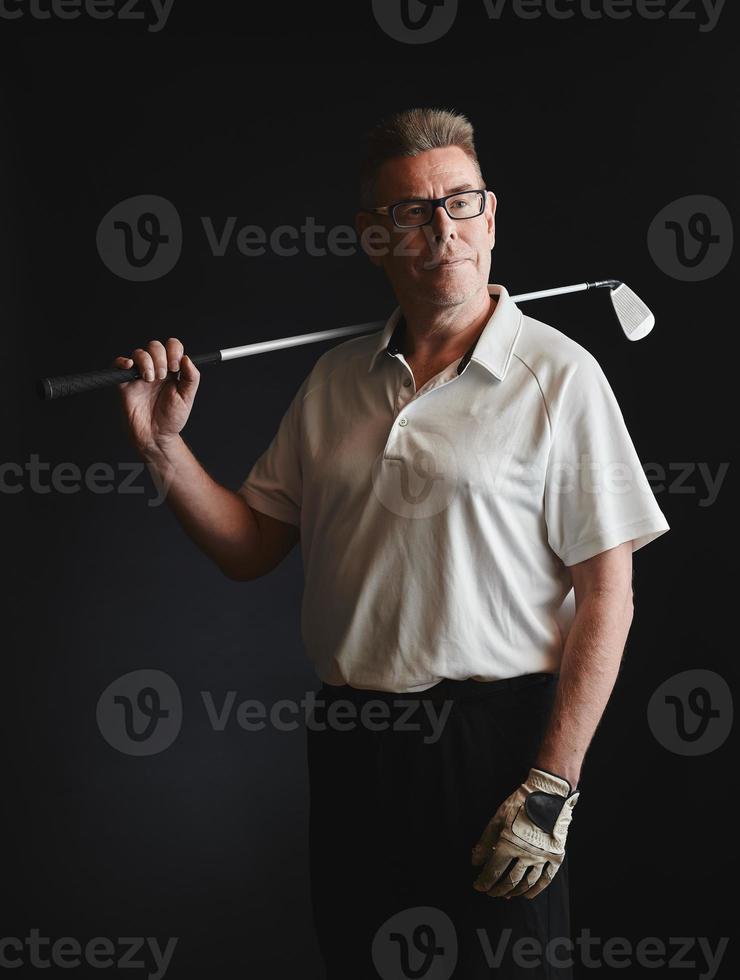 golfista e golf club dell'uomo maturo foto