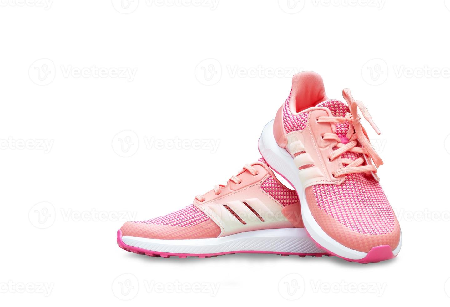 scarpe sportive rosa su sfondo bianco isolato foto