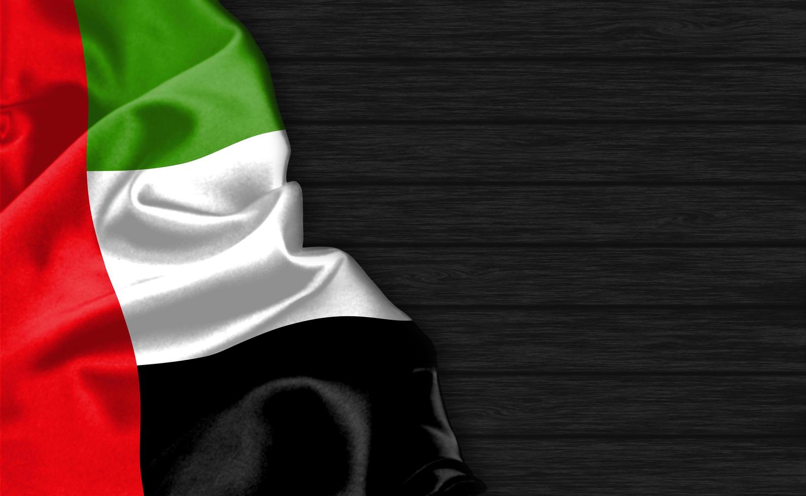 Primo piano della rappresentazione 3d della bandiera degli emirati arabi uniti foto