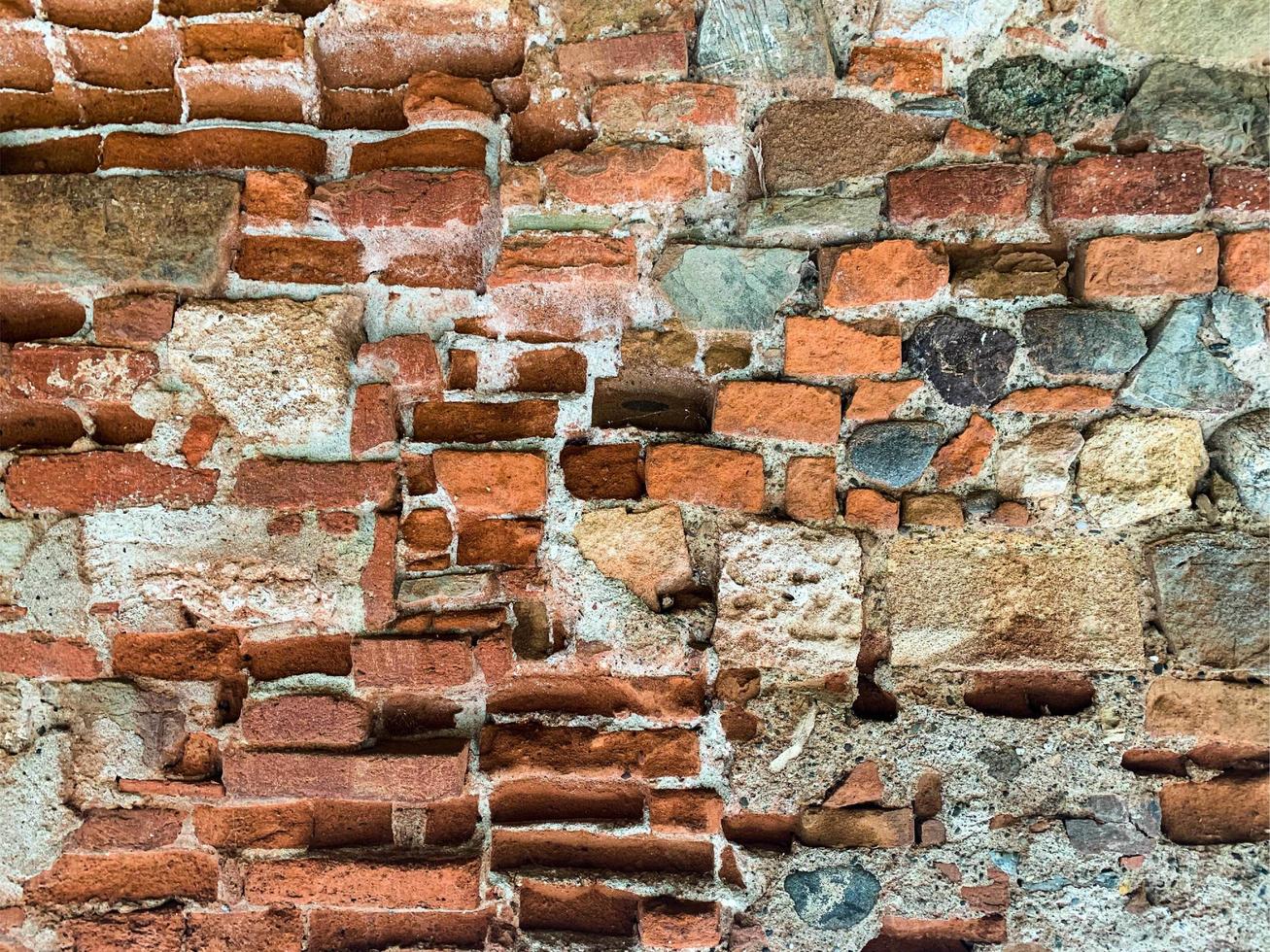 vecchio muro di mattoni sfondo. struttura del muro di mattoni foto