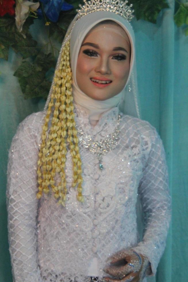 bella sposa musulmana indonesiana. foto