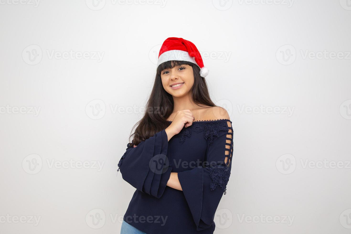 giovane donna con cappello da Babbo Natale. foto