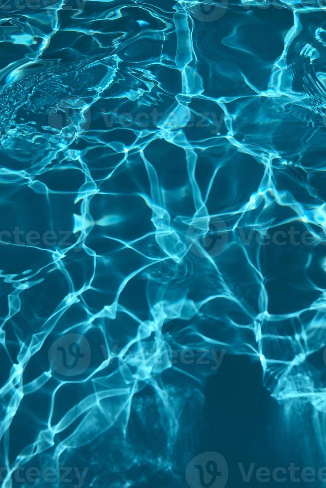 sfondo astratto blu della superficie dell'acqua. foto