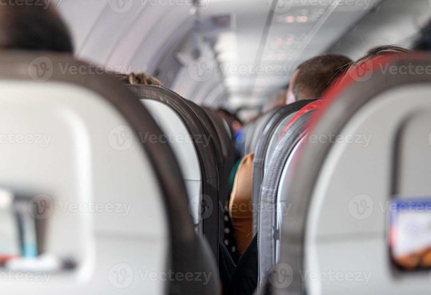 posti all'interno di un aereo su un volo commerciale foto