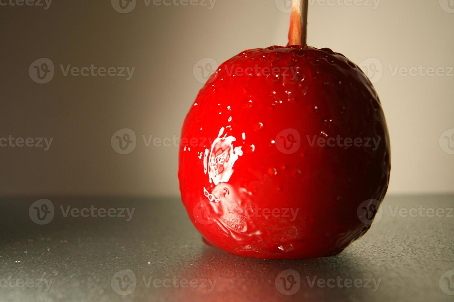 mela caramella rossa foto