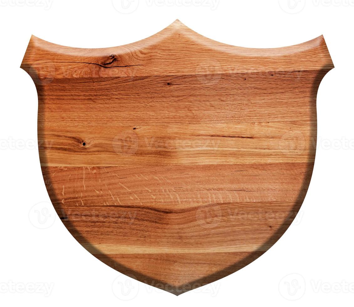 scudo di legno isolato su bianco. legno di quercia naturale foto