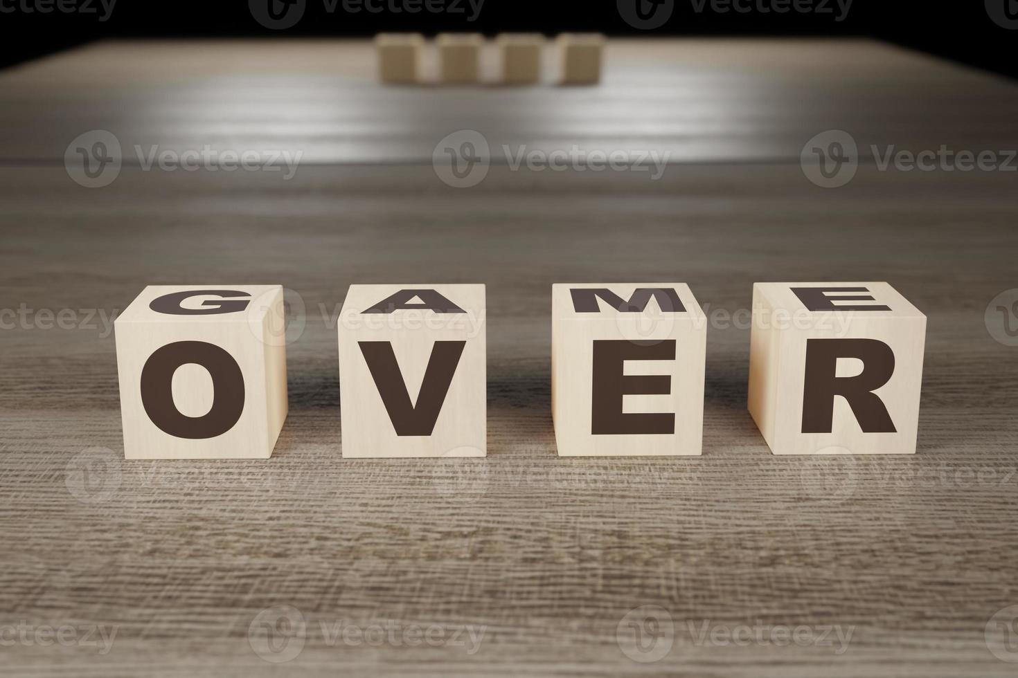 game over parole fatte di cubi di legno. concetto di gioco. illustrazione di videogiochi e giochi per computer. sfondo sfocato, rendering 3d. foto