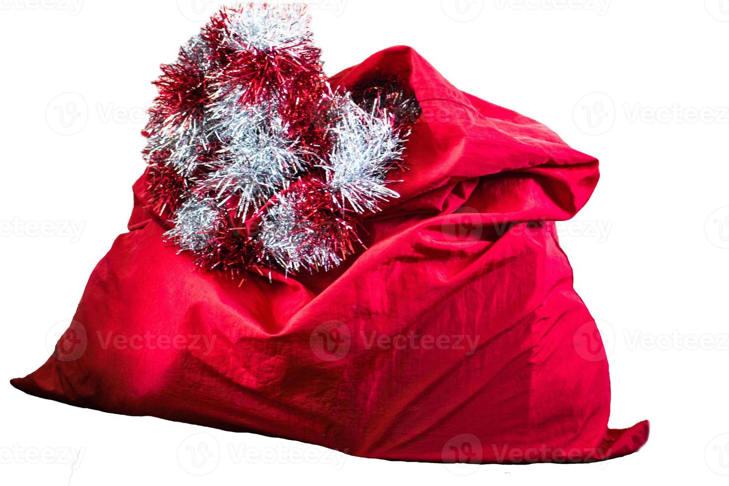 borsa rossa di Babbo Natale, isolata su sfondo bianco. foto