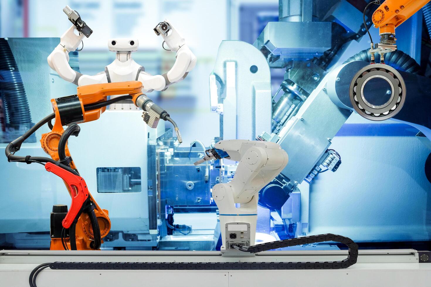 saldatura robotica industriale, presa di robot e robot intelligente che lavora su una fabbrica intelligente foto