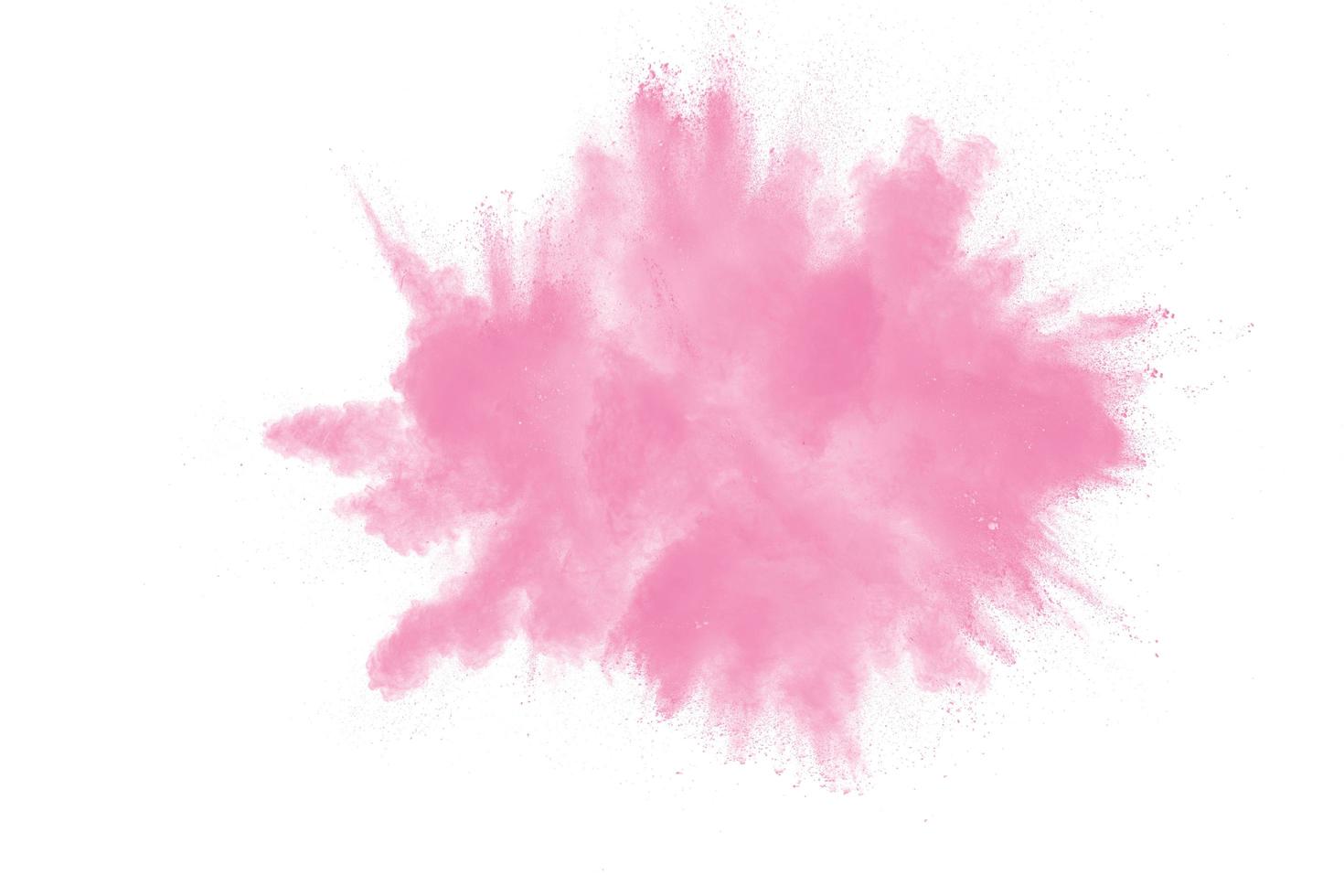 esplosione di polvere rosa isolata su sfondo bianco. foto