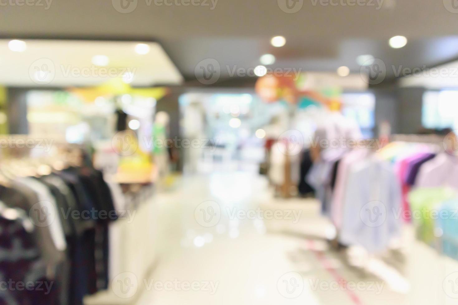 astratto sfocatura boutique di abbigliamento display interno dello sfondo del centro commerciale foto