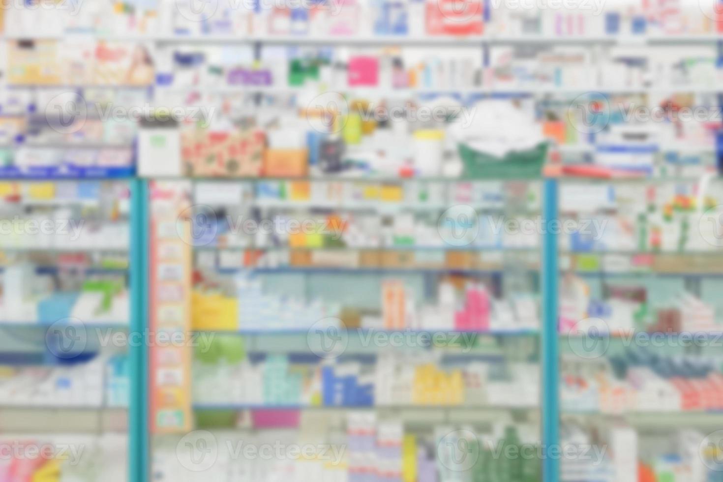 farmacia farmacia sfocatura sfondo astratto con medicinali e prodotti sanitari sugli scaffali foto