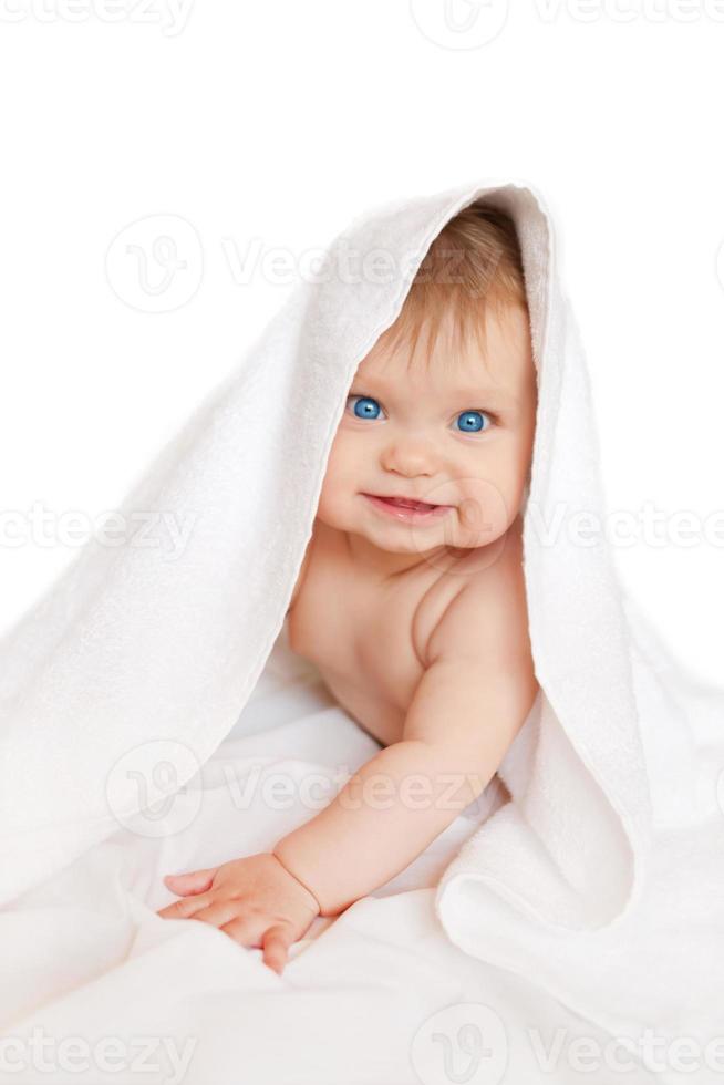 bambino con asciugamano foto