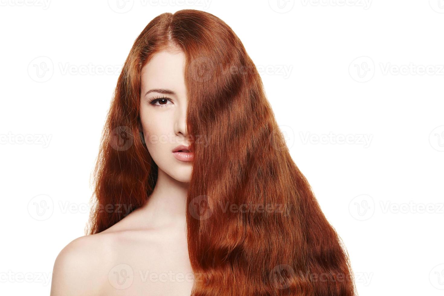 bella donna con i capelli rossi foto