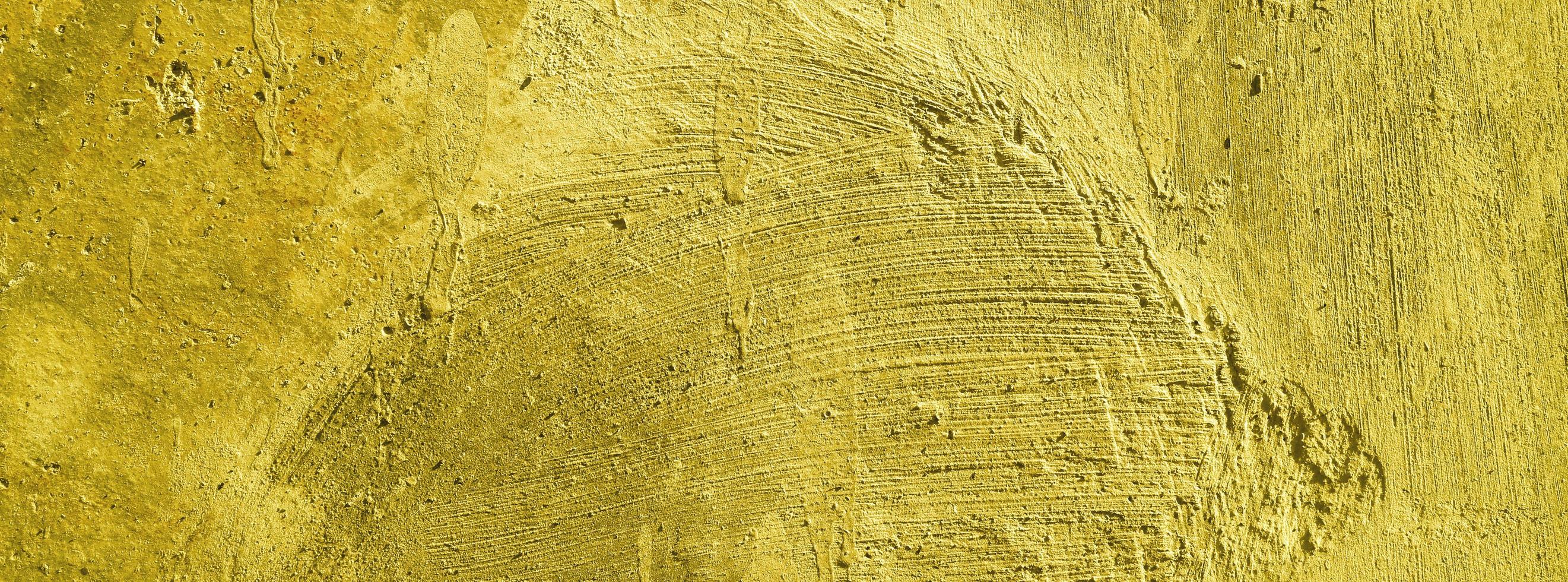 sfondo giallo muro. muro di cemento intonacato sfondo giallo antigraffio. trama grunge. foto
