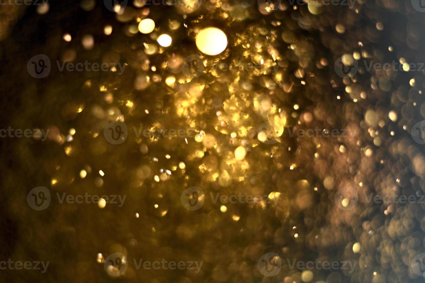 golden glitter bokeh illuminazione texture sfocato sfondo astratto per compleanno, anniversario, matrimonio, capodanno o natale foto